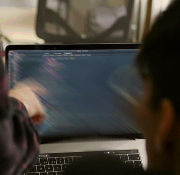 Developer working in front of a screen